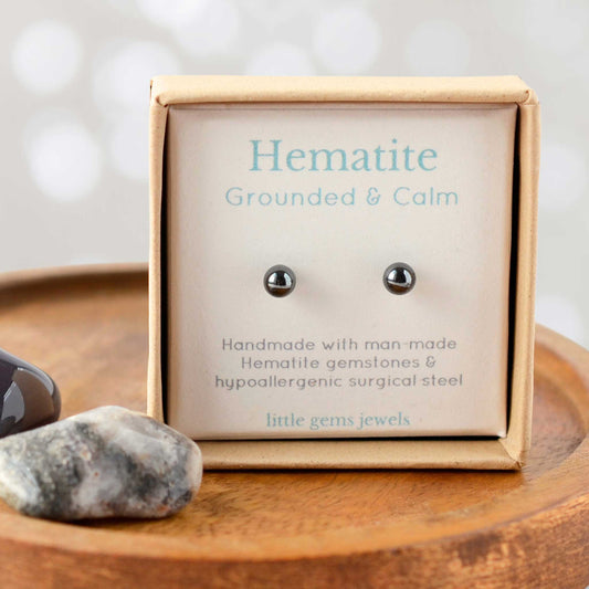Hematite gemstone for grounding and calm stud earrings in eco friendly gift box.