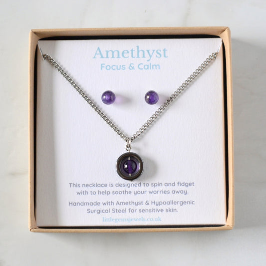 Amethyst gemstone spinner necklace and matching stud earring set in an eco friendly gift box.