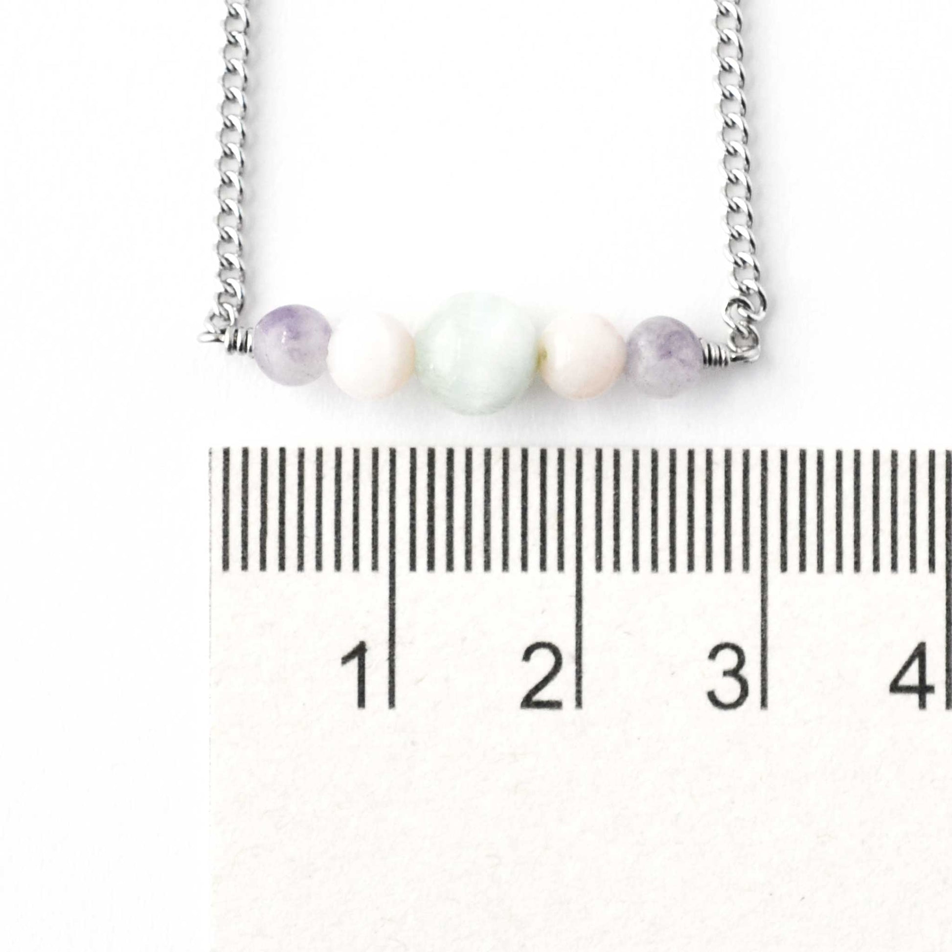 Larimar, Pink Opal & Lepidolite gemstone bar necklace next to ruler