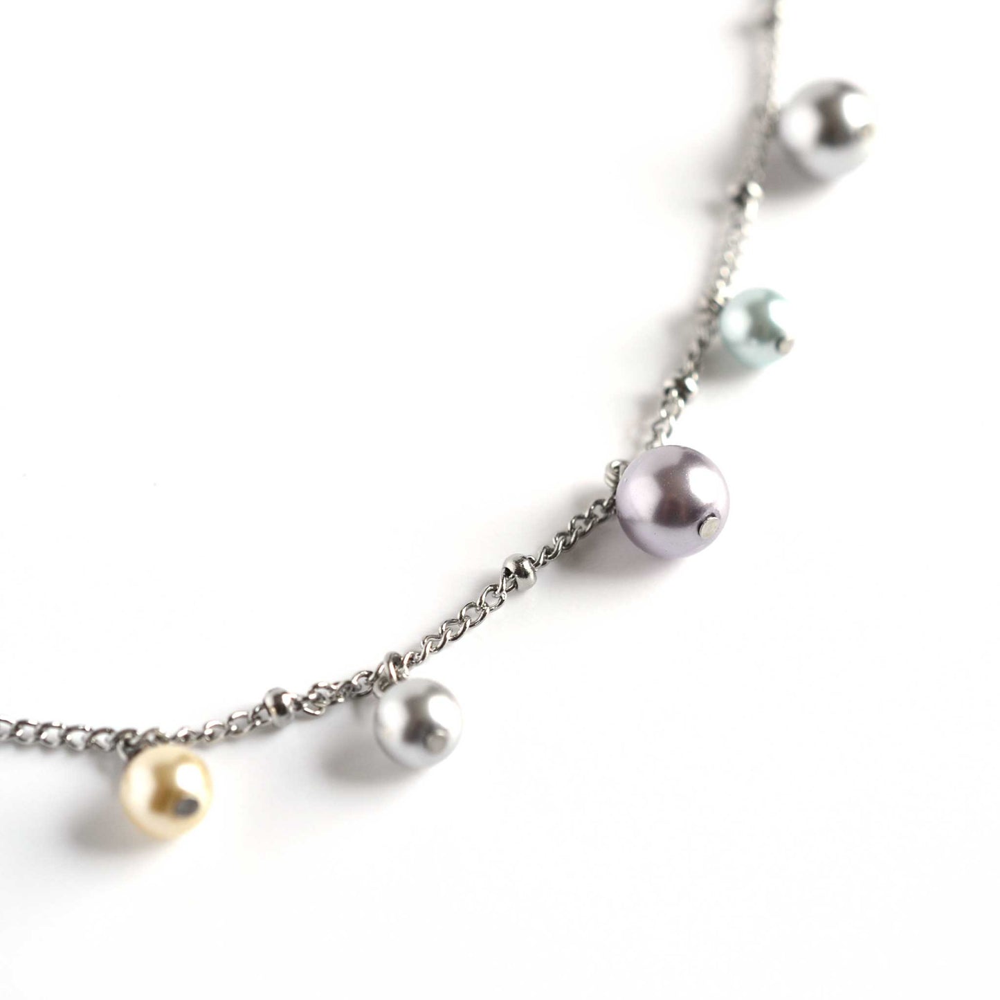 Close up of faux pearl charms necklace