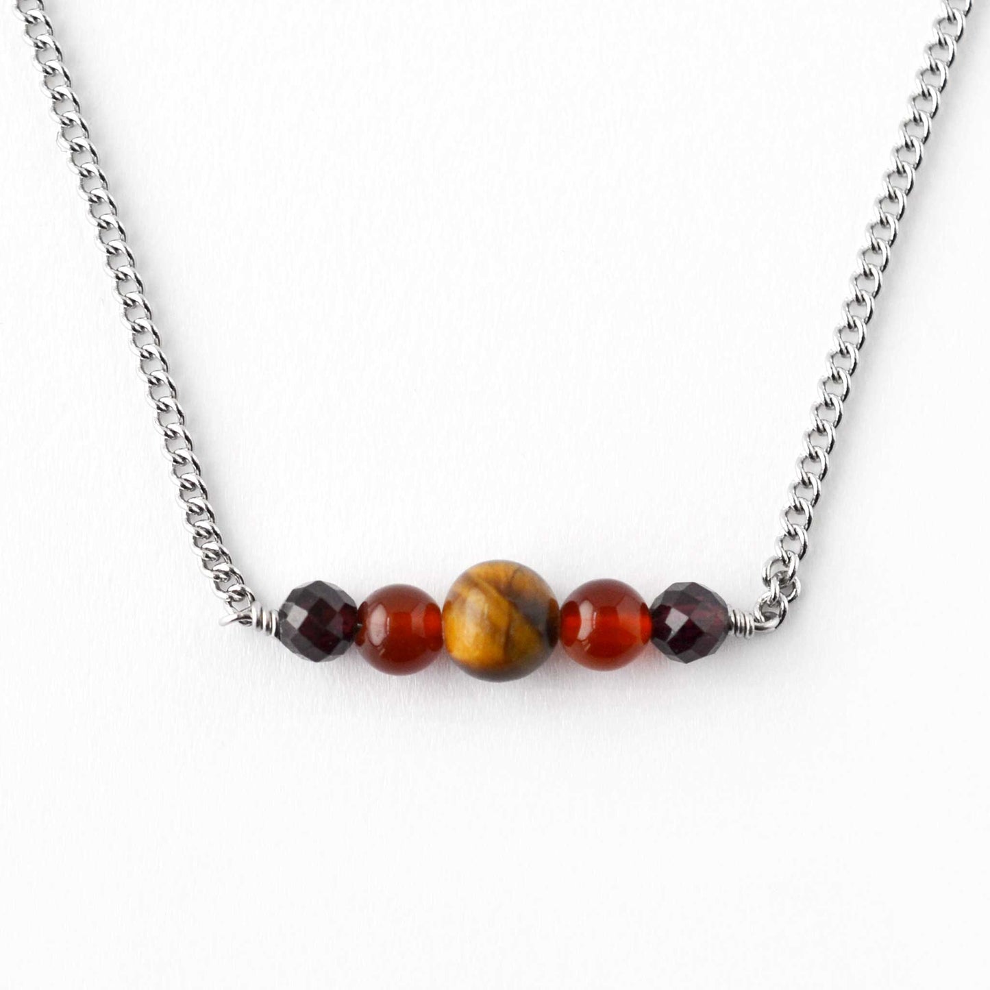 Tigers Eye, Carnelian & Garnet gemstone bar necklace on white background