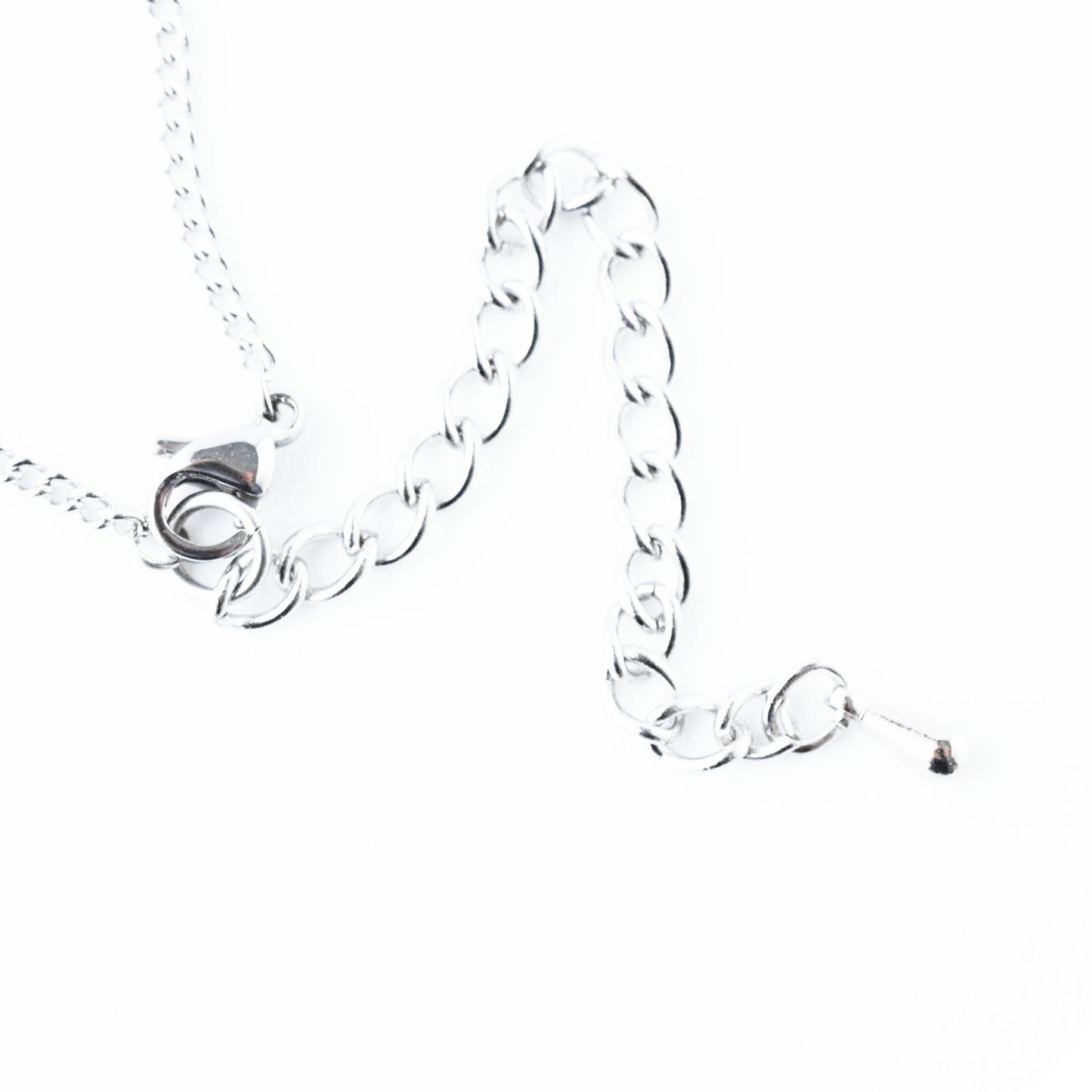 Close up of stainless steel exnteder chain with dropper.