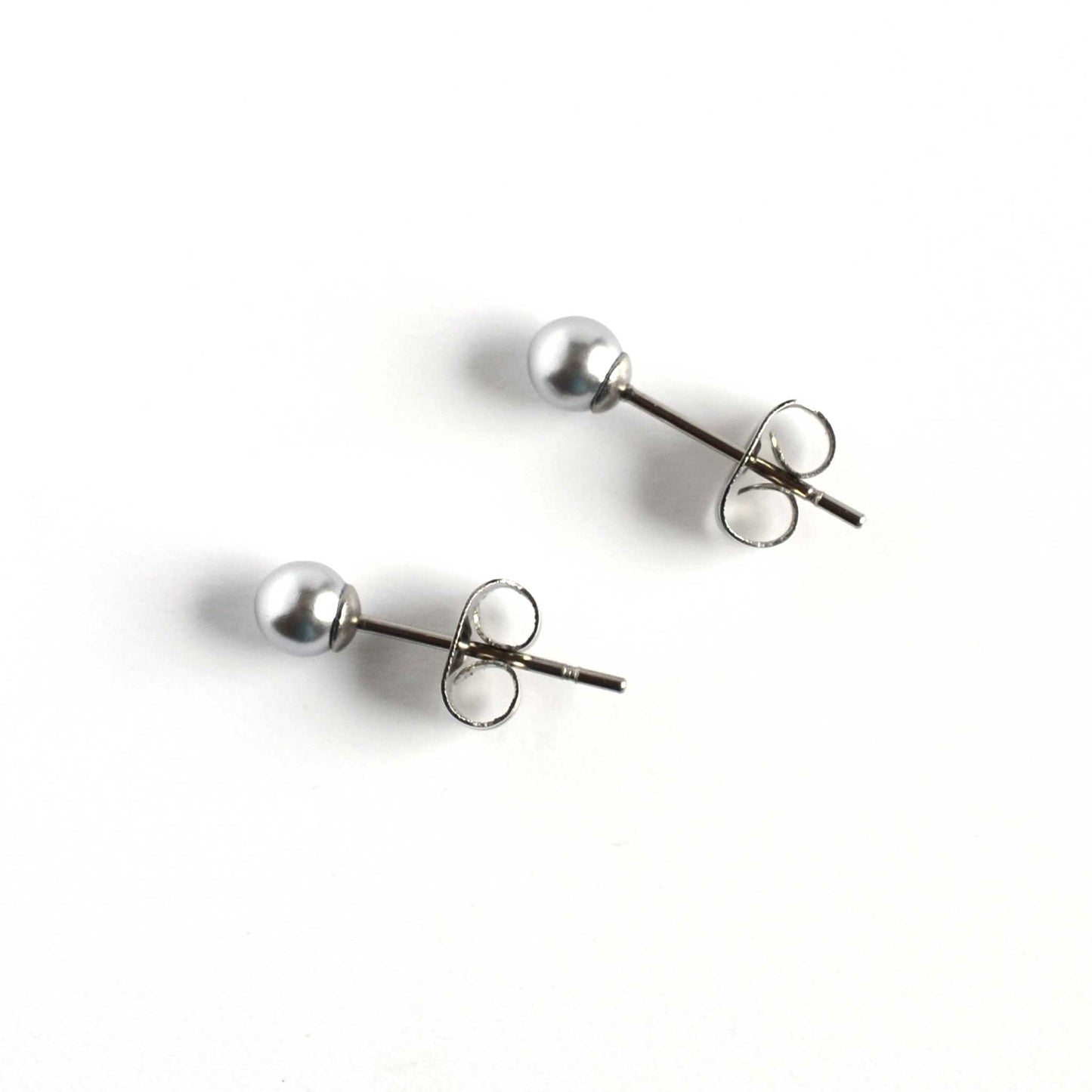 4mm Grey Faux Pearl Studs On White Background