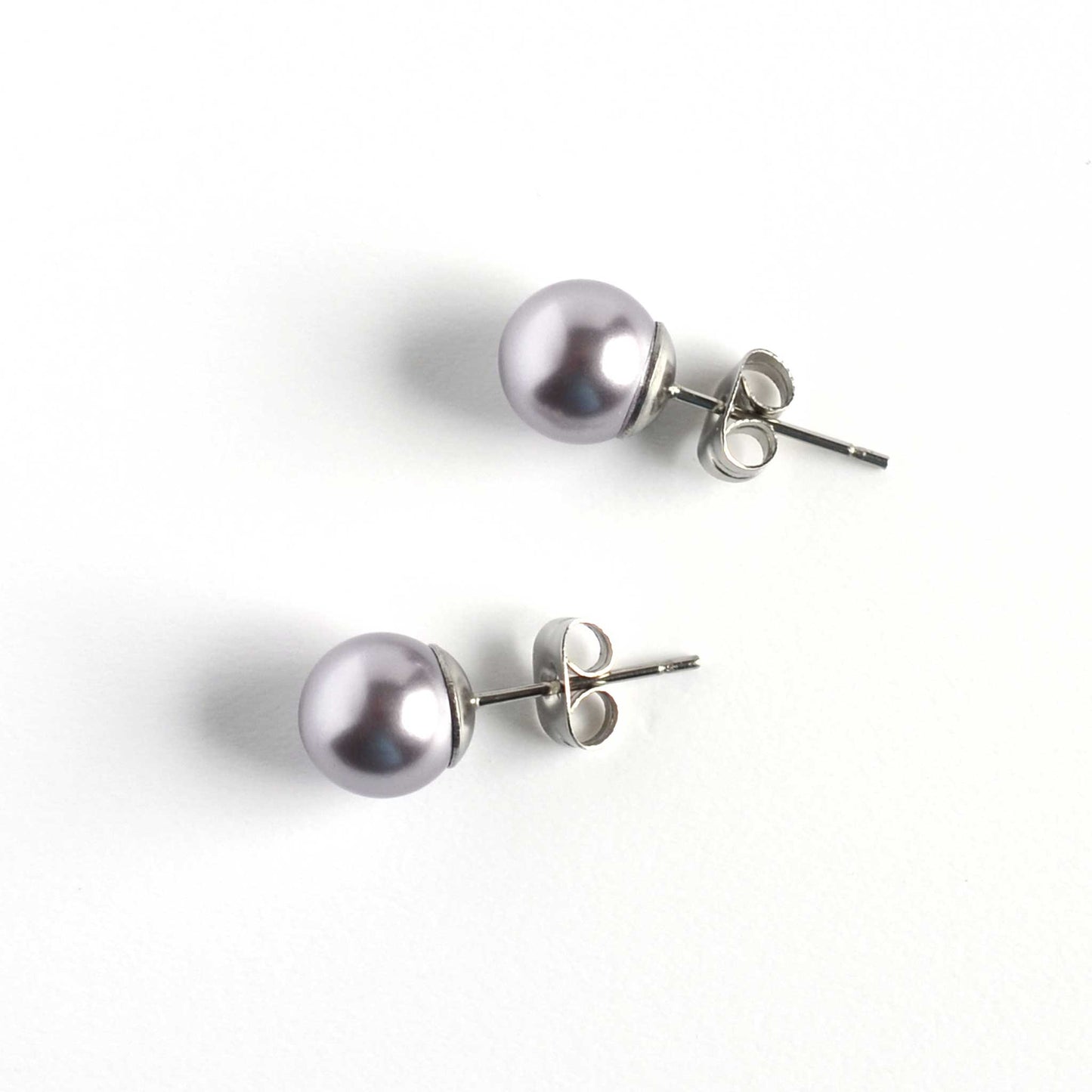 8mm Purple Faux Pearl Studs On White Background
