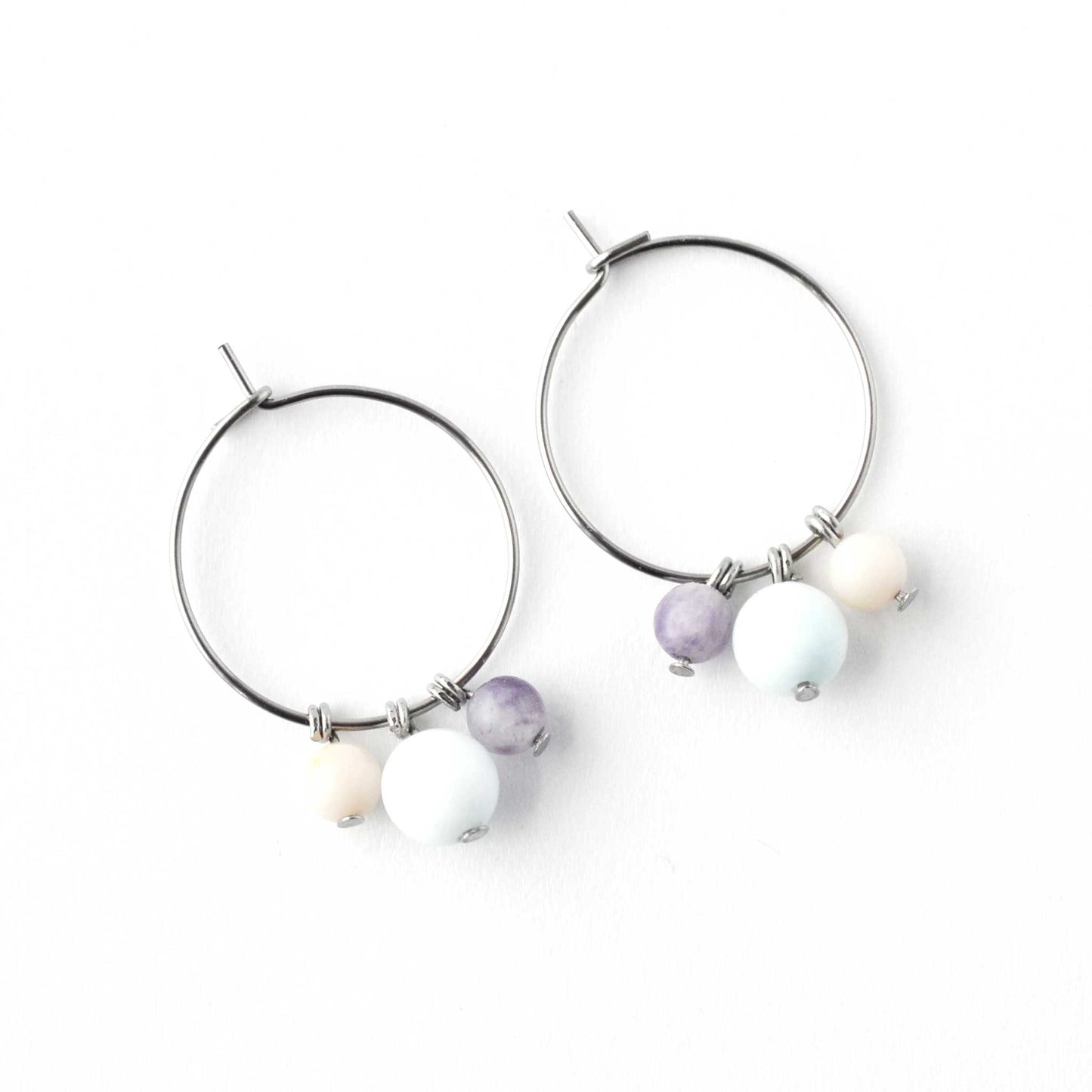 Flatlay Larimar, Pink Opal & Lepidolite gemstone hoop earrings on white background