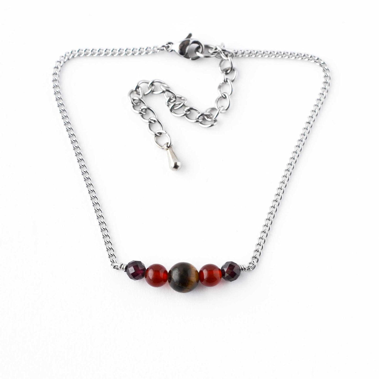 Tigers Eye, Carnelian & Garnet gemstone adjustable bracelet on white background