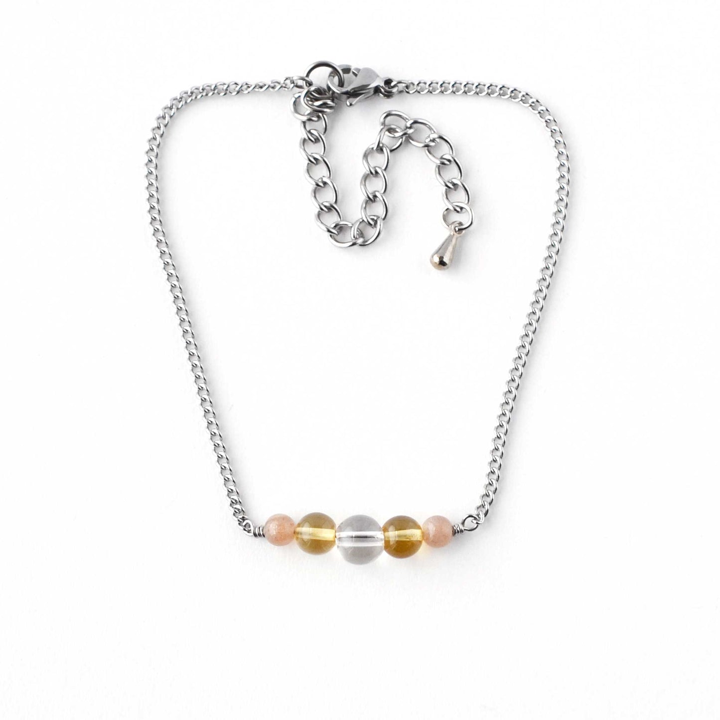 Rock Crystal, Citrine & Sunstone gemstone bracelet on white background