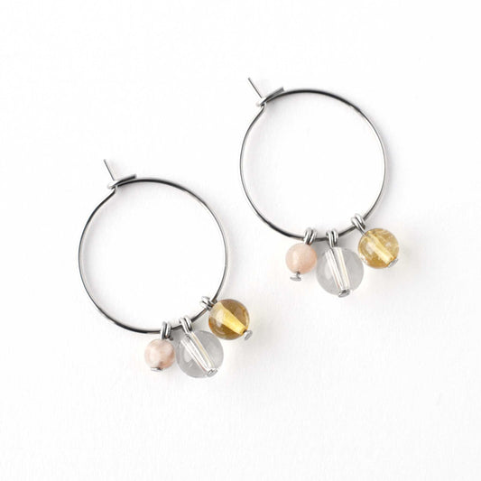 Flatlay Sunstone, Rock Crystal & Citrine gemstone hoop earrings on white background