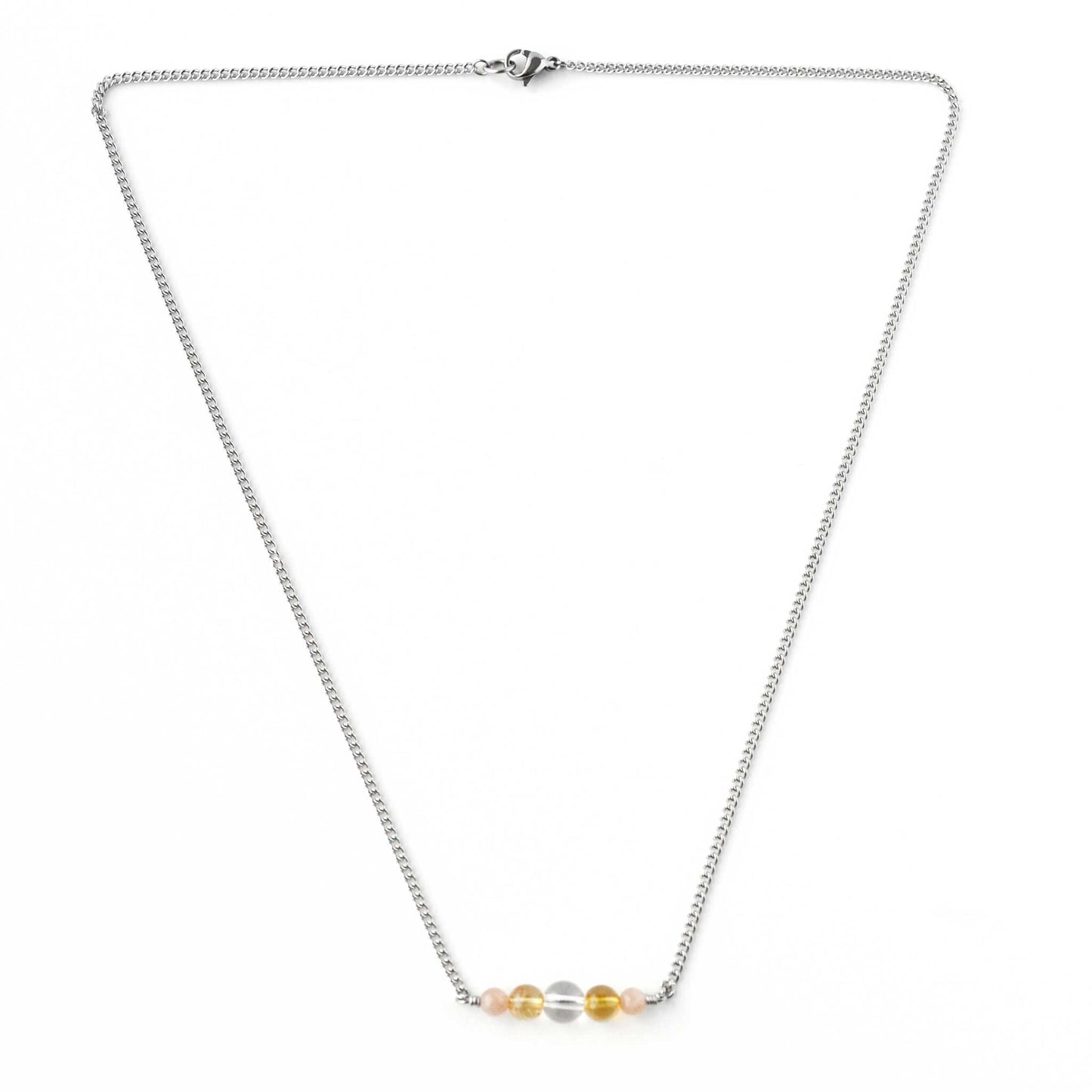 Flatlay dainty yellow gemstone necklace with stainless steel chain and lobster clasp