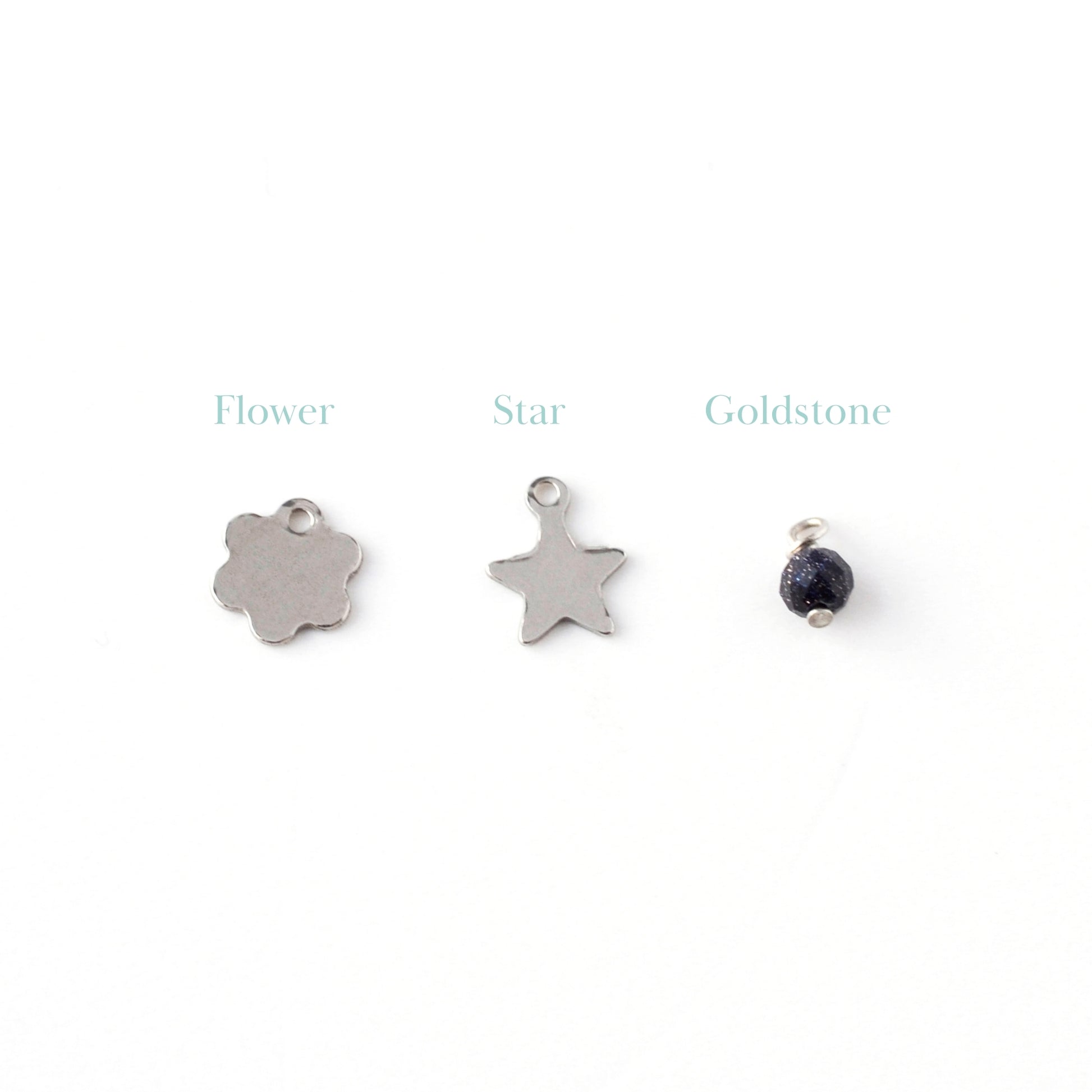 Dainty hammered flower and star charms with 4mm goldstone gemstone charm.
