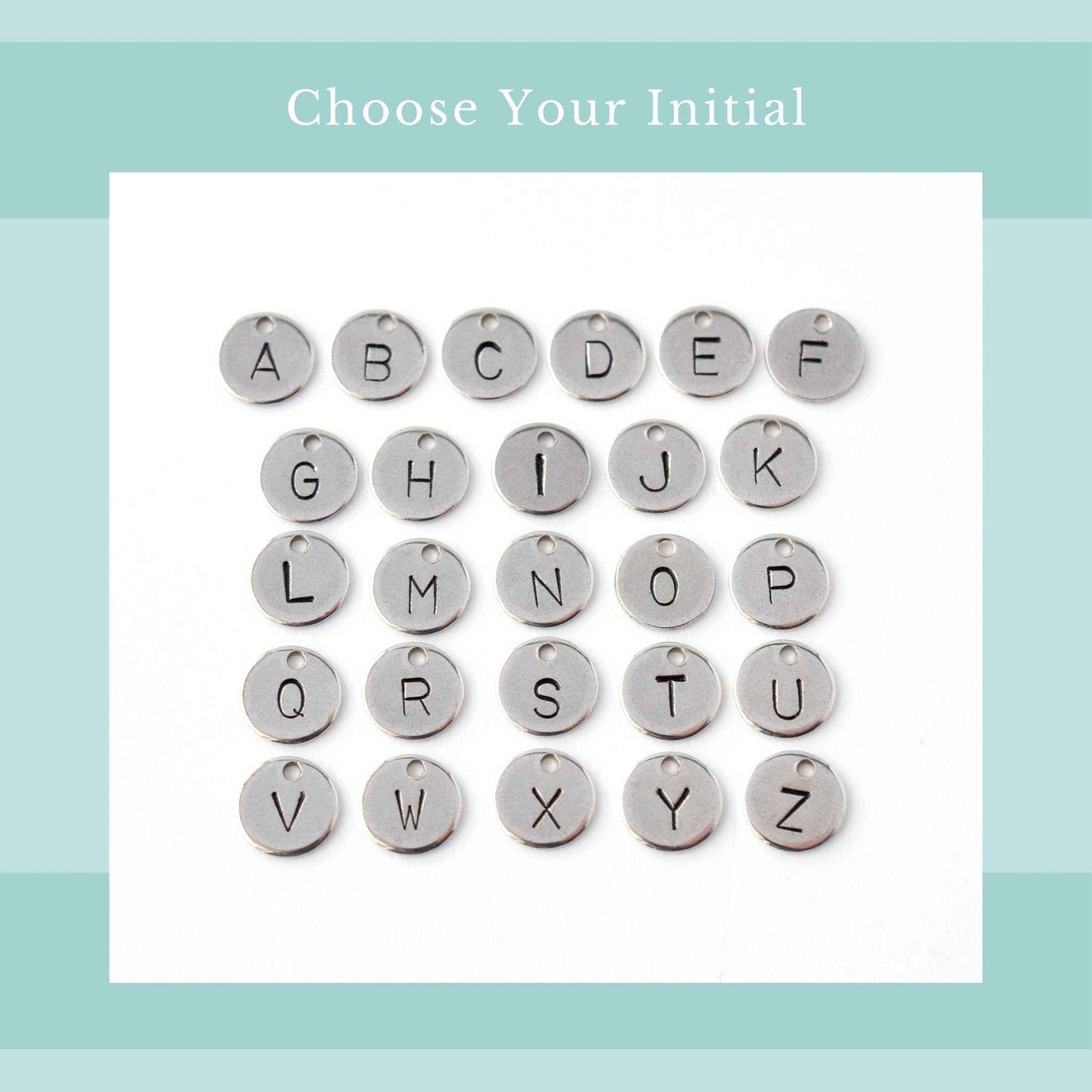 Choose your initial graphic with image of all twenty six letters of the alphabet in simple font hand stamped onto tiny disc pendants