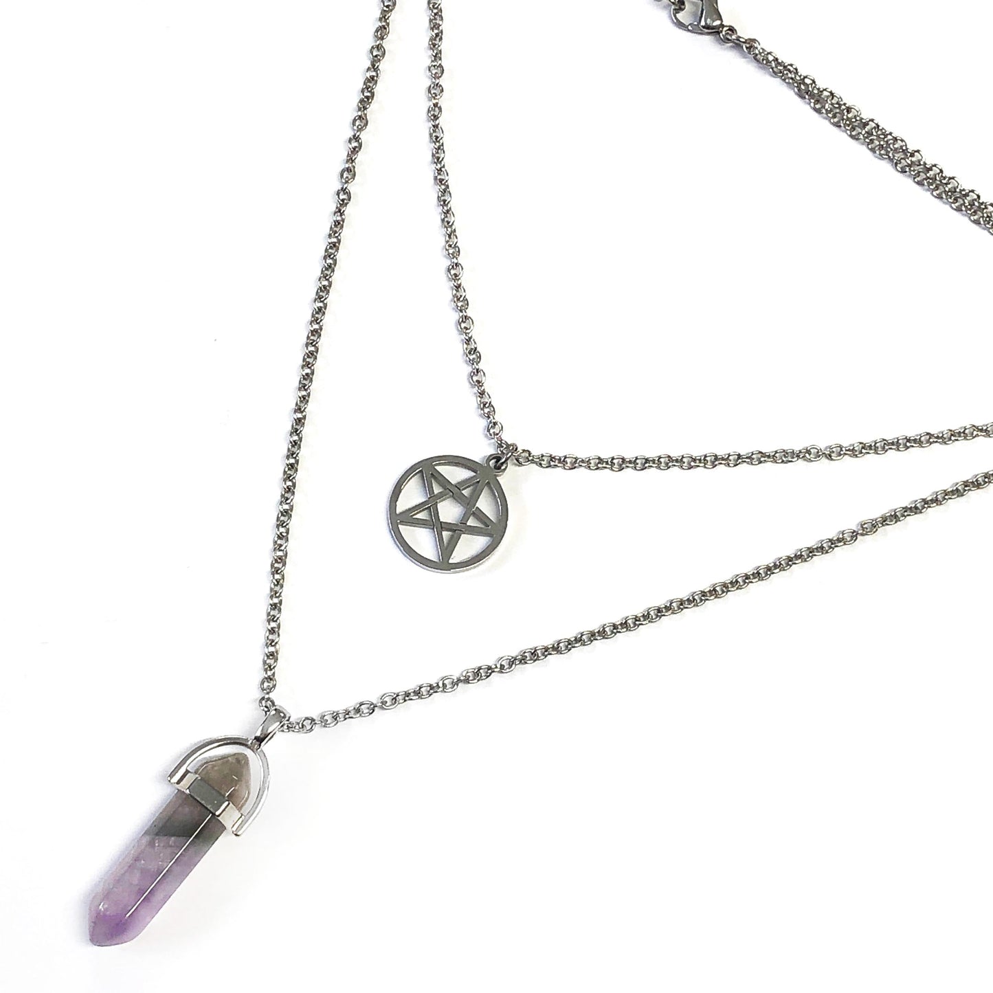 Necklace with a pentagram pendant and amethyst crystal on a white background