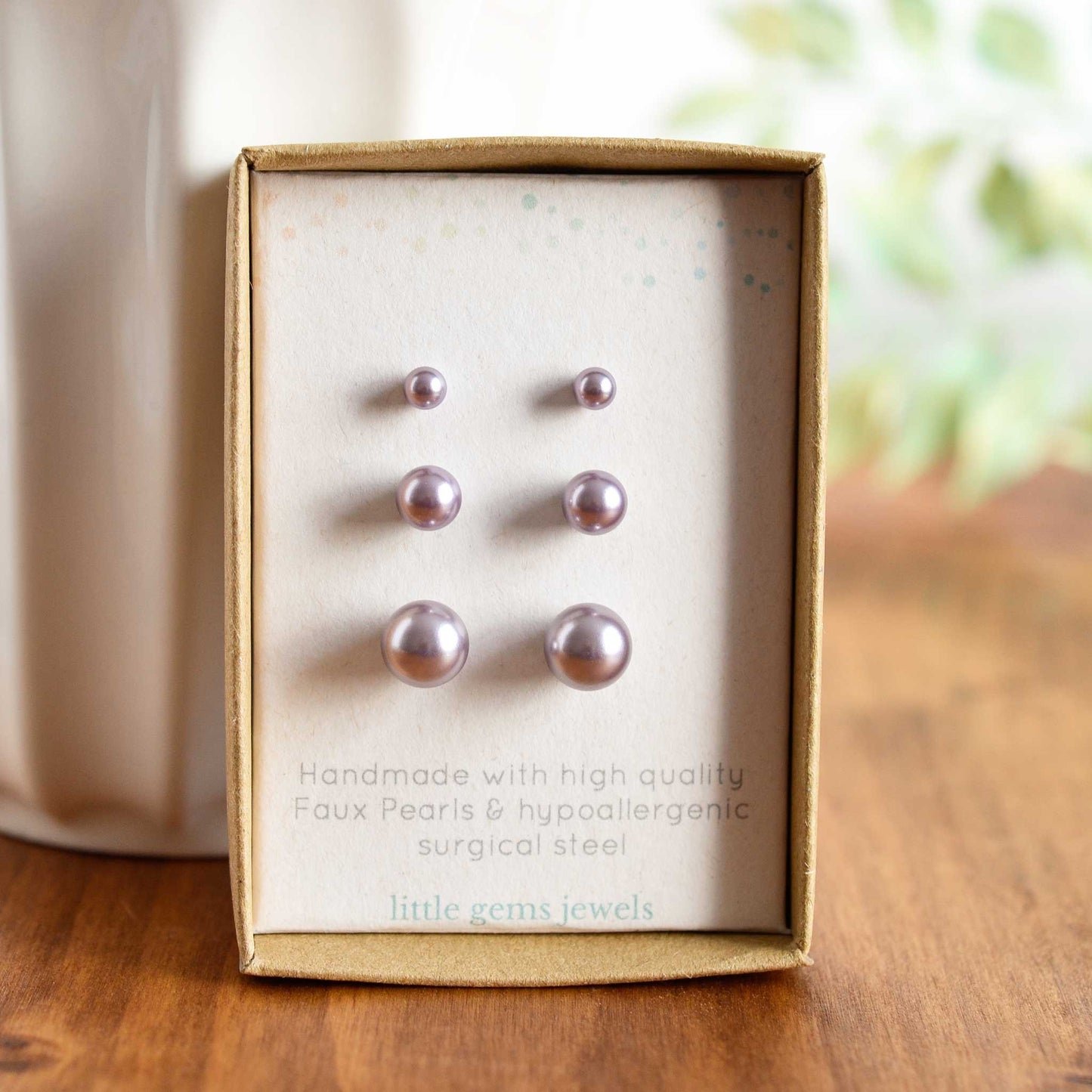 Set of three pale purple faux pearl stud earrings in eco friendly gift box