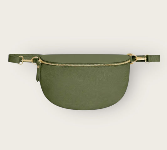 Green waist bag on a light gray background