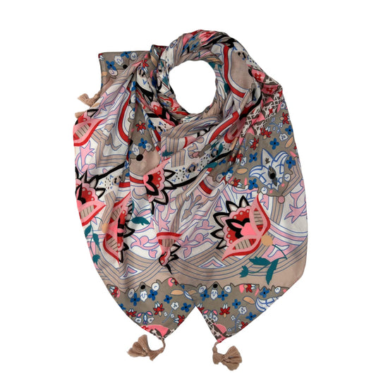 Colorful patterned scarf with tassels on a white background