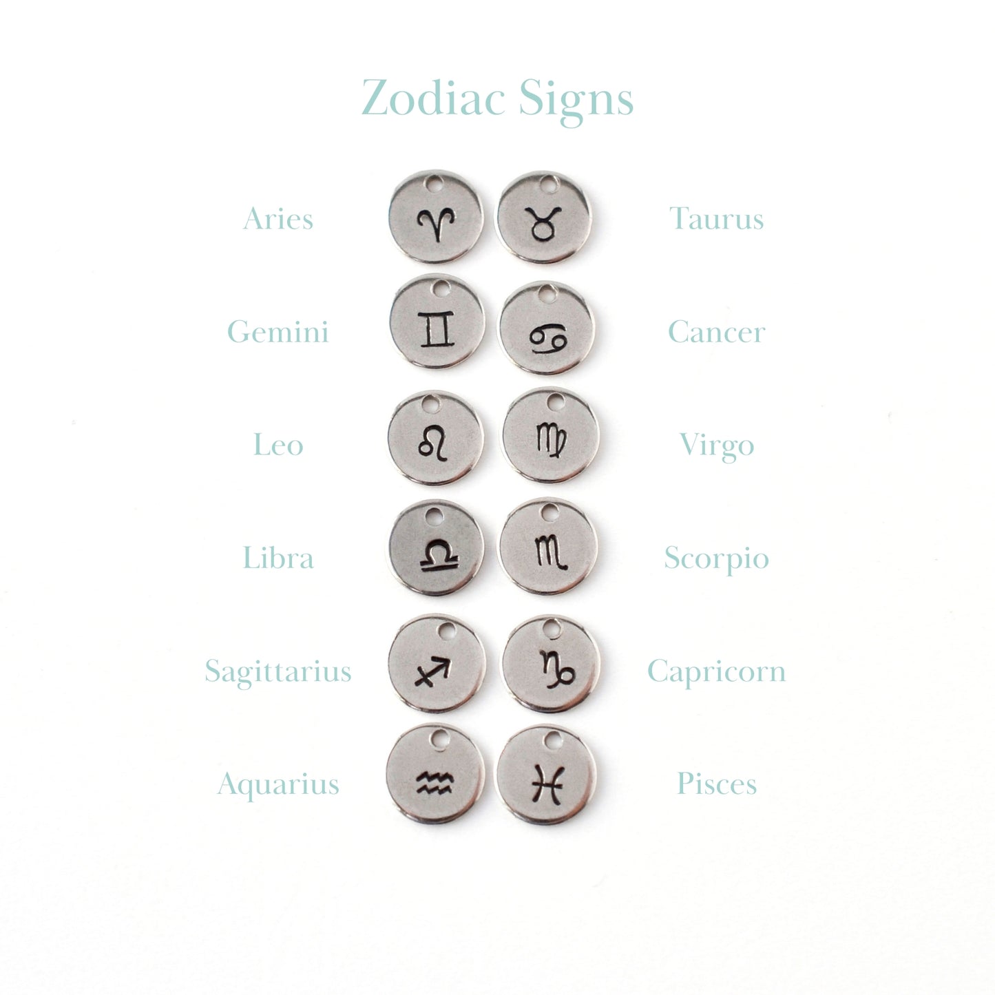 Handstamped zodiac sign charms.