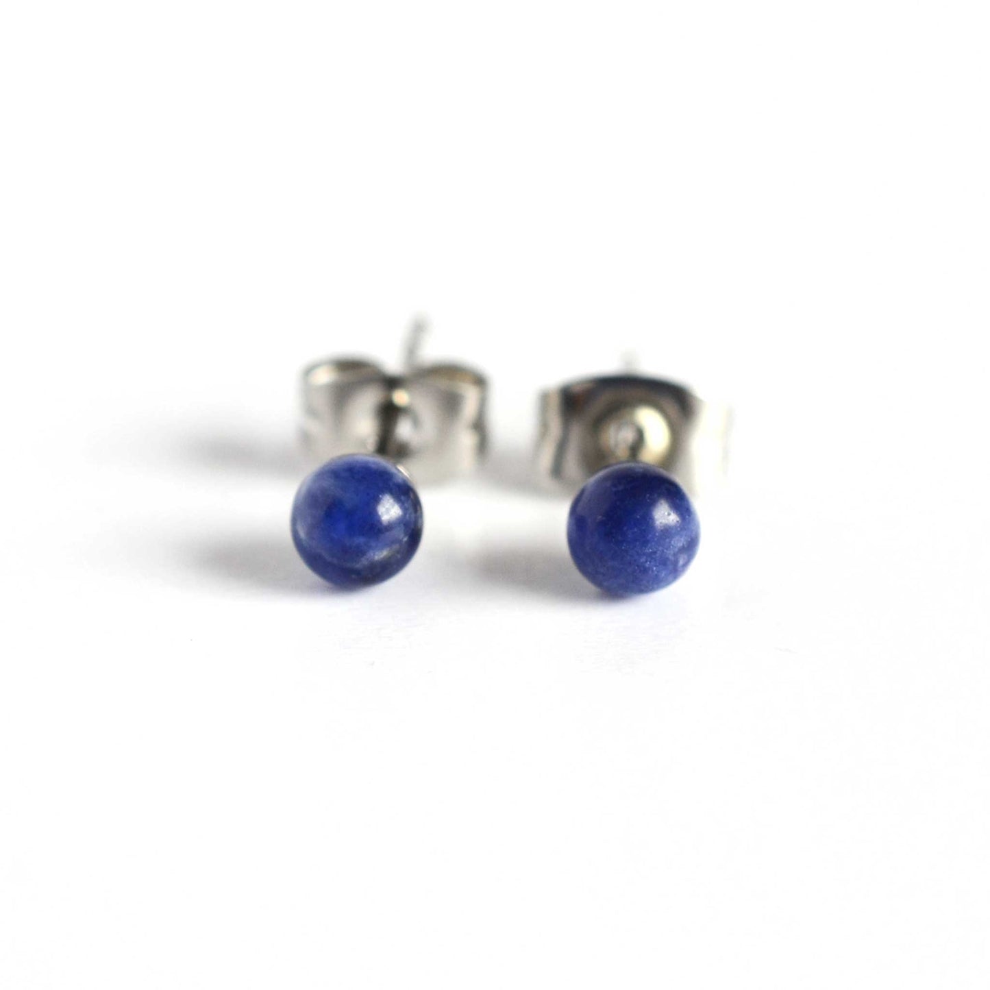Front view of Sodalite small blue stud earrings on white background