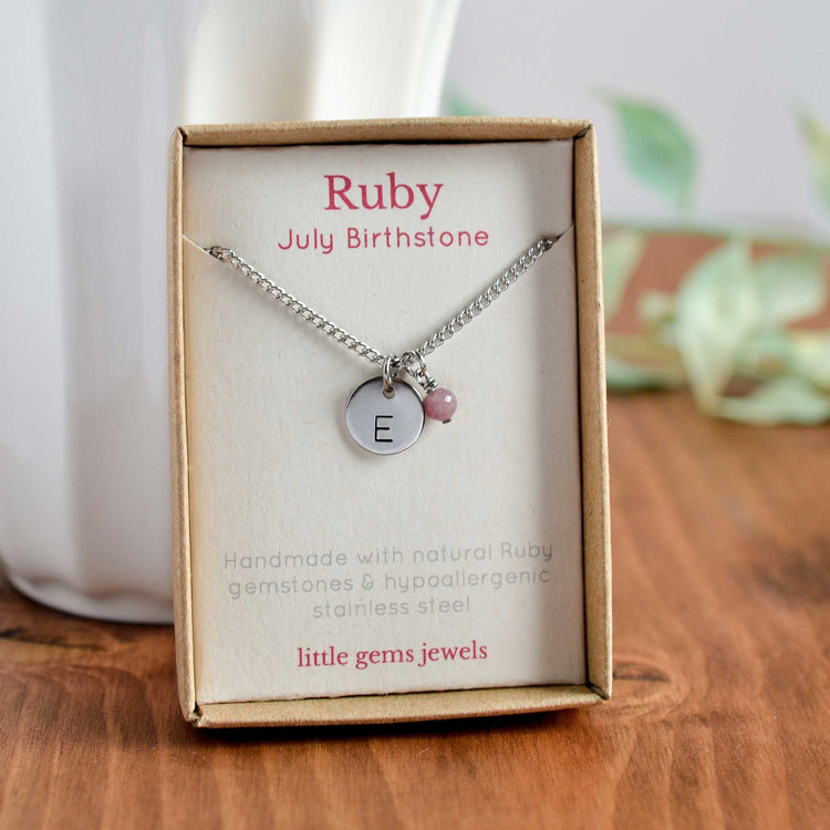 Ruby July birthstone necklace with initial charm in eco friendly gift box