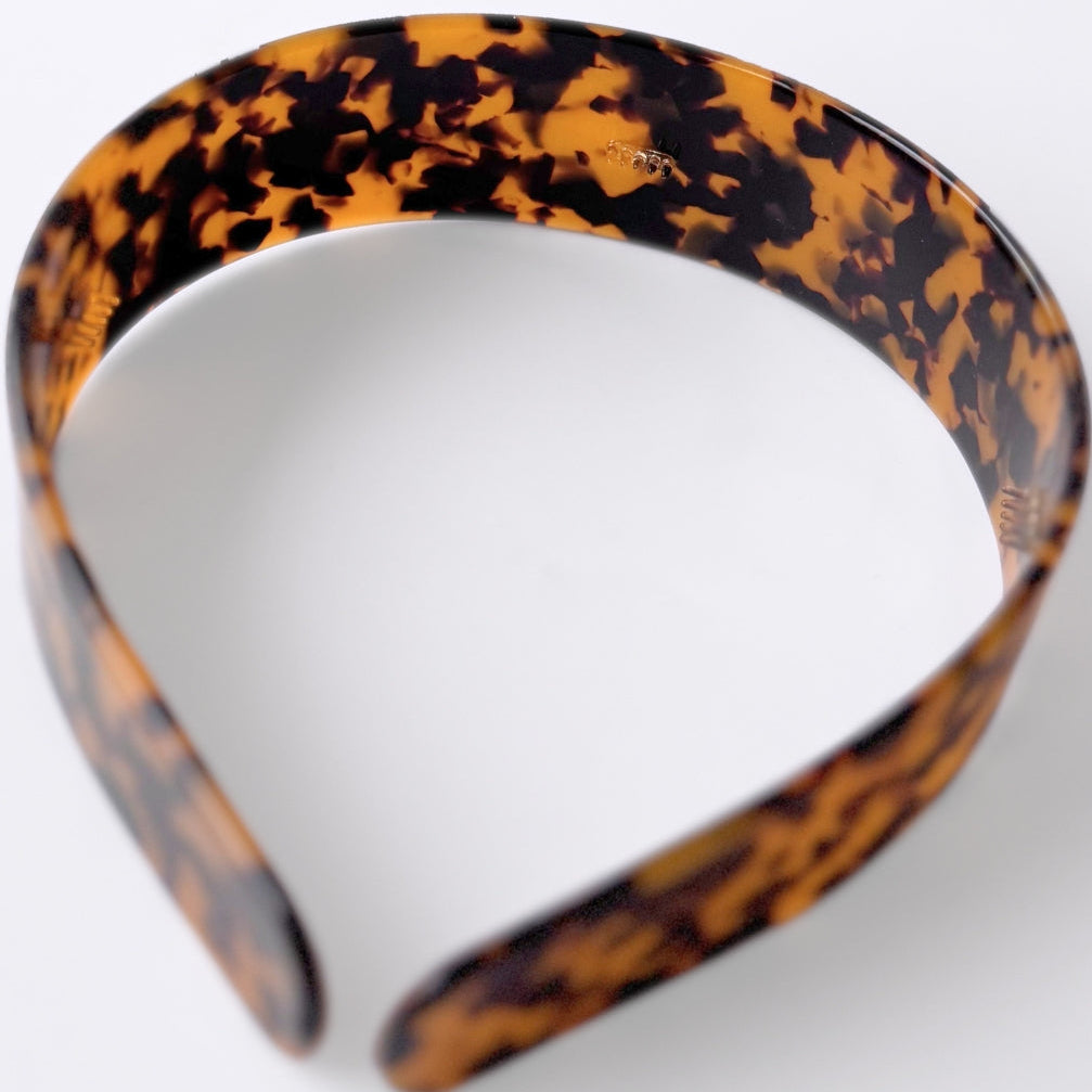 Tortoiseshell headband on a white background