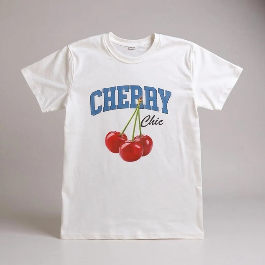 White t-shirt with 'Cherry Chic' design on a gray background