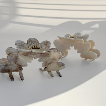 Set of two hair clips on a light background