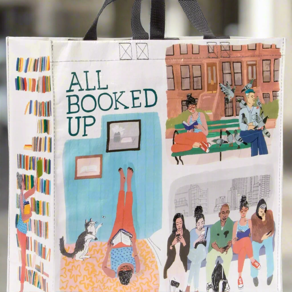 Bag with illustrations of people and books, featuring the text 'All Booked Up'.