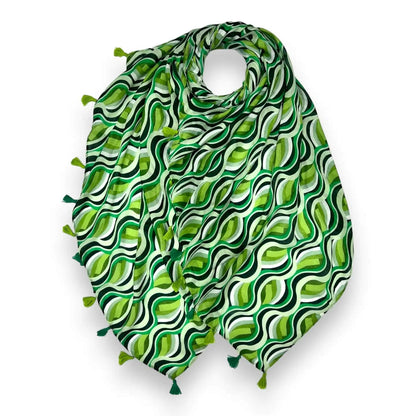 Green patterned scarf with tassels on a white background