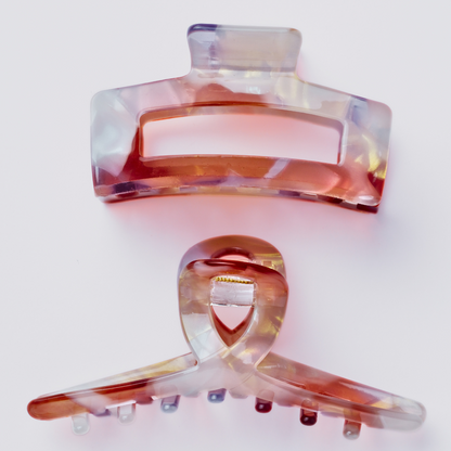 Multicolored hair clips on a white background