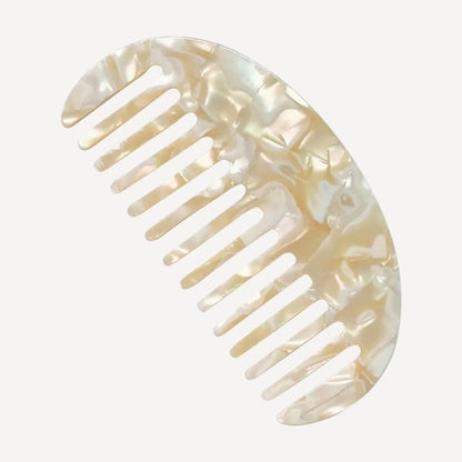 Shell comb on a white background