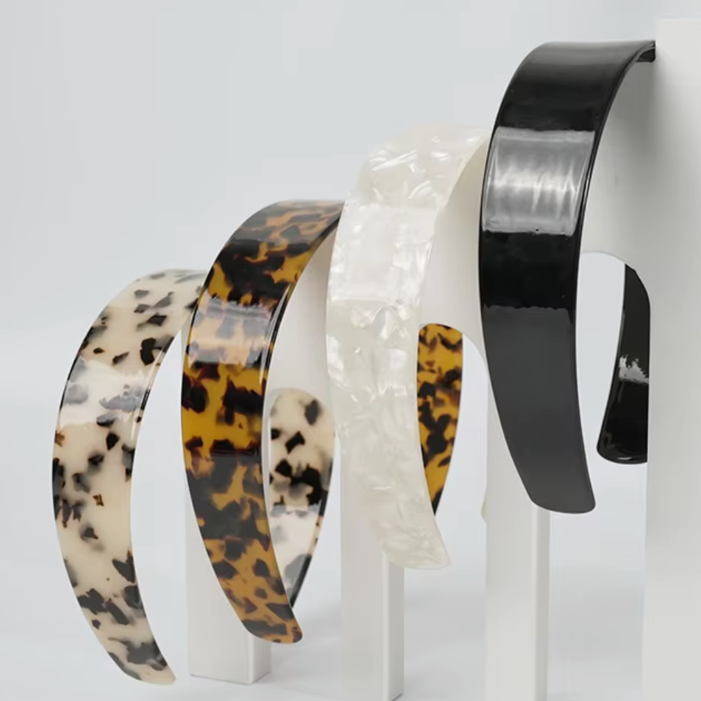 Set of four headbands with different patterns on a white background