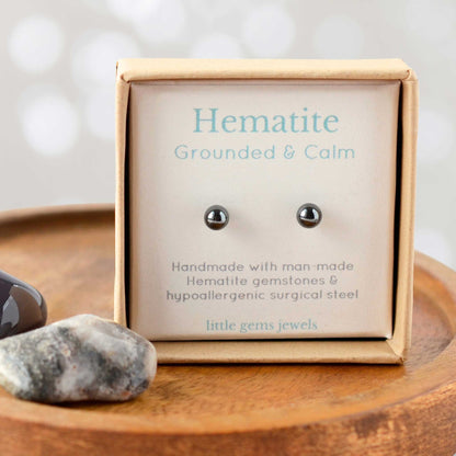 Hematite gemstone for grounding and calm stud earrings in eco friendly gift box.