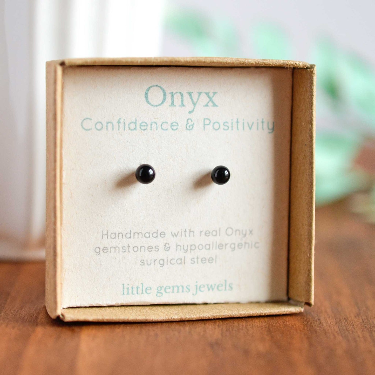 Tiny black Onyx stud earrings in eco friendly gift box