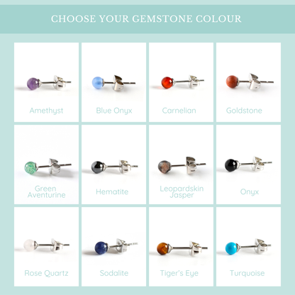 A color selection chart showing twelve gemstone stud earrings arranged in a grid on a pale aqua background.