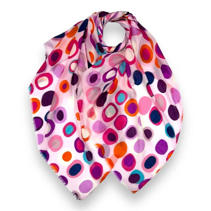Colorful polka dot scarf on a white background