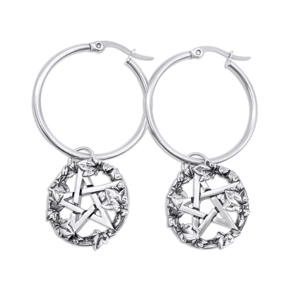 Steel hoop earrings with star-shaped designs on a white background