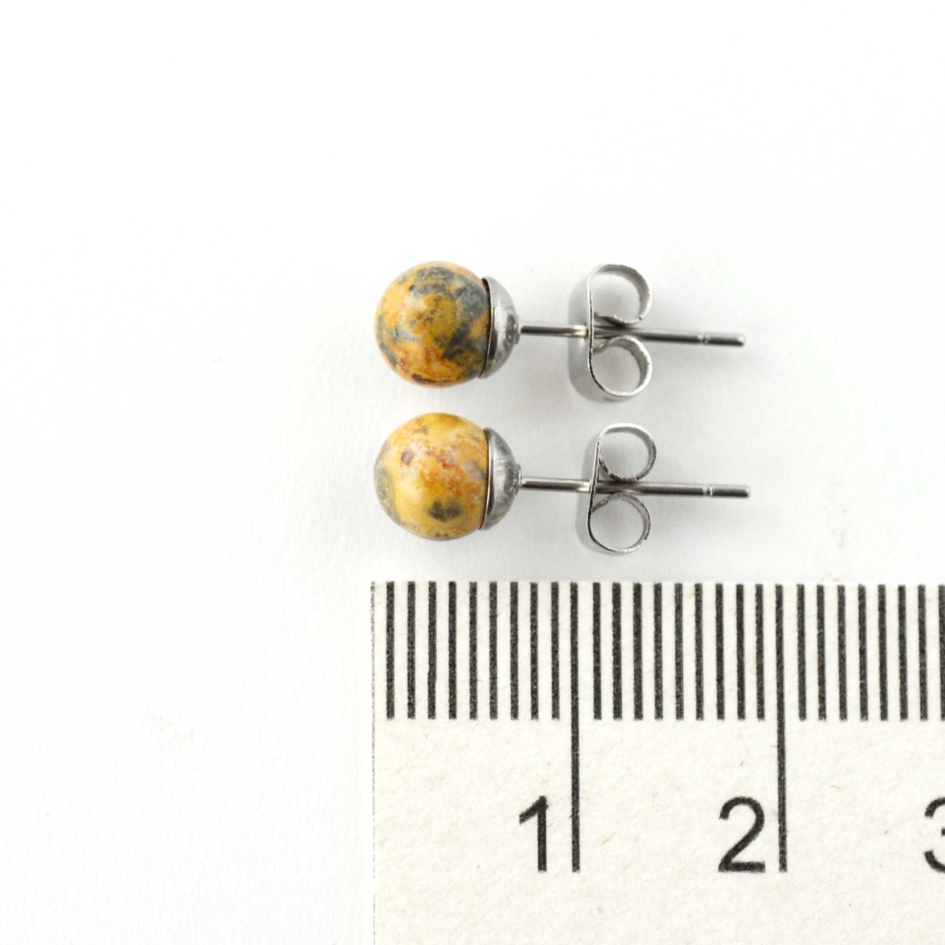 6mm Jasper gemstone earrings next to ruler