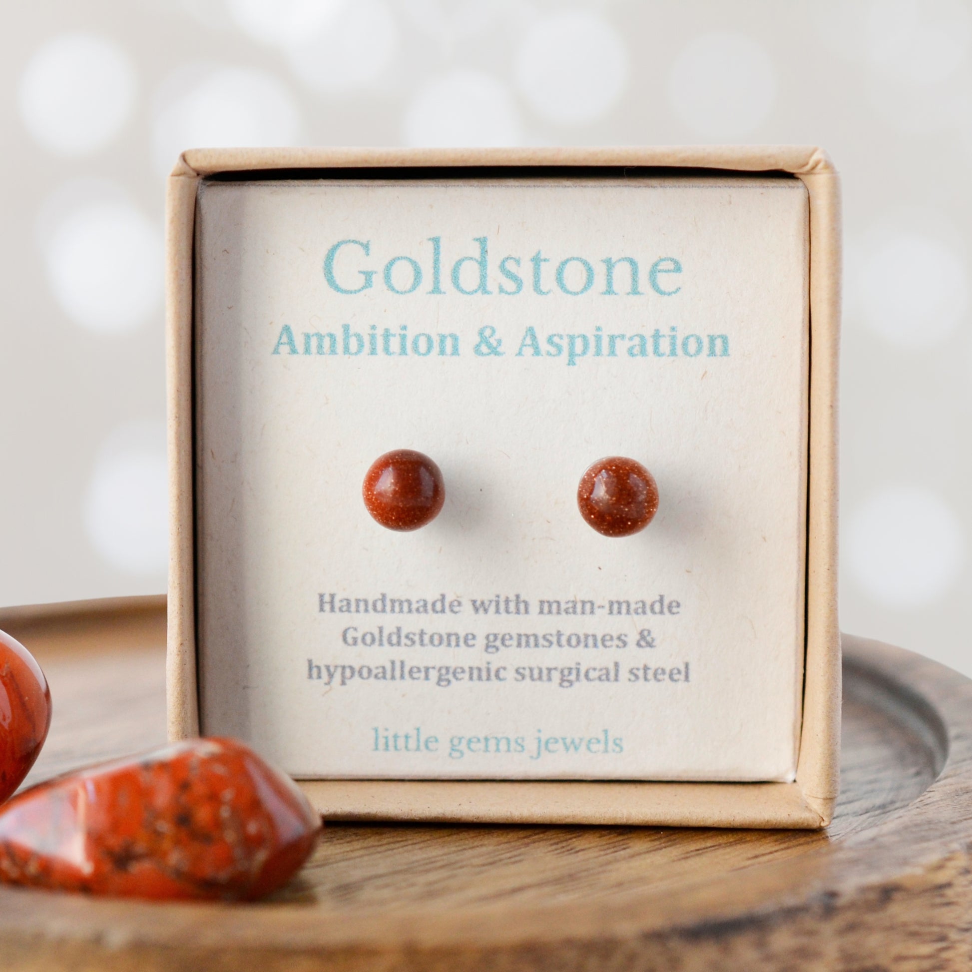 Goldstone for ambition and aspiration gemstone stud earrings in sco friendly gift box.