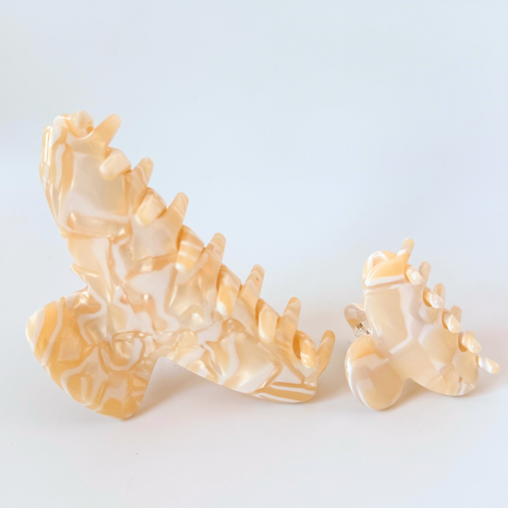 Decorative hair clips on a light blue background