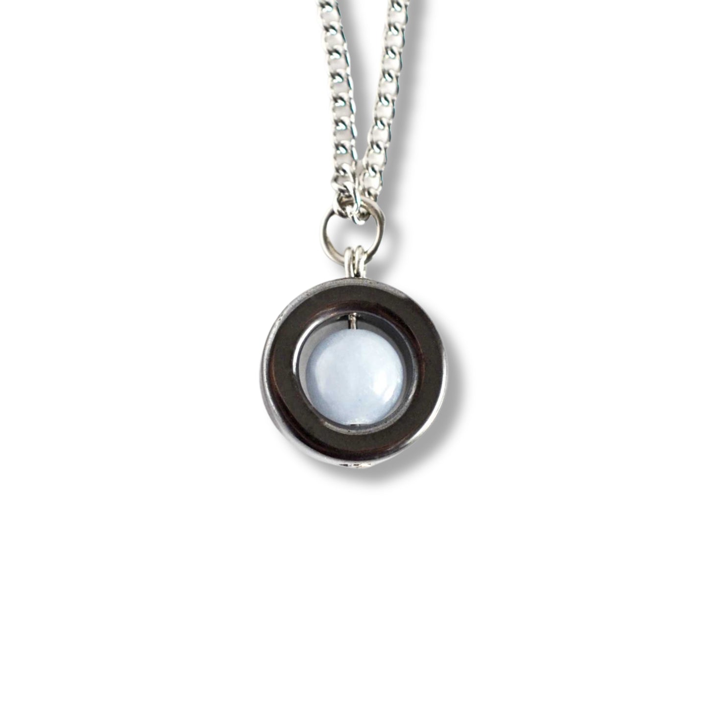 Angelite & Hematite gemstone spinner necklace on white background.
