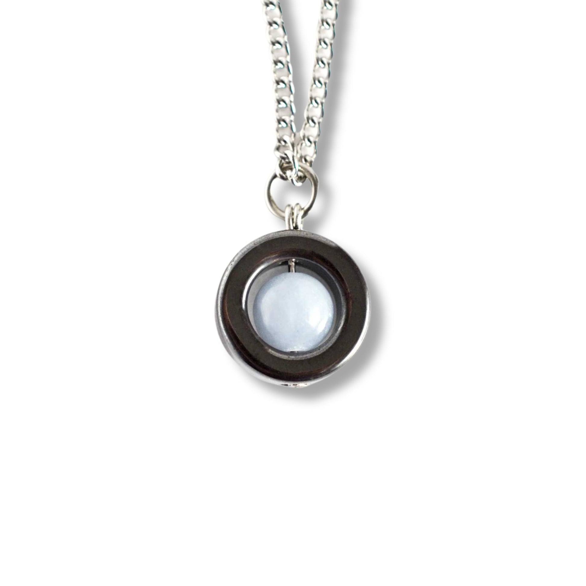 Angelite & Hematite gemstone spinner necklace on white background.