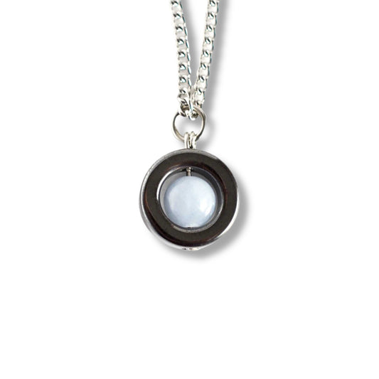 Angelite & Hematite gemstone spinner necklace on white background.