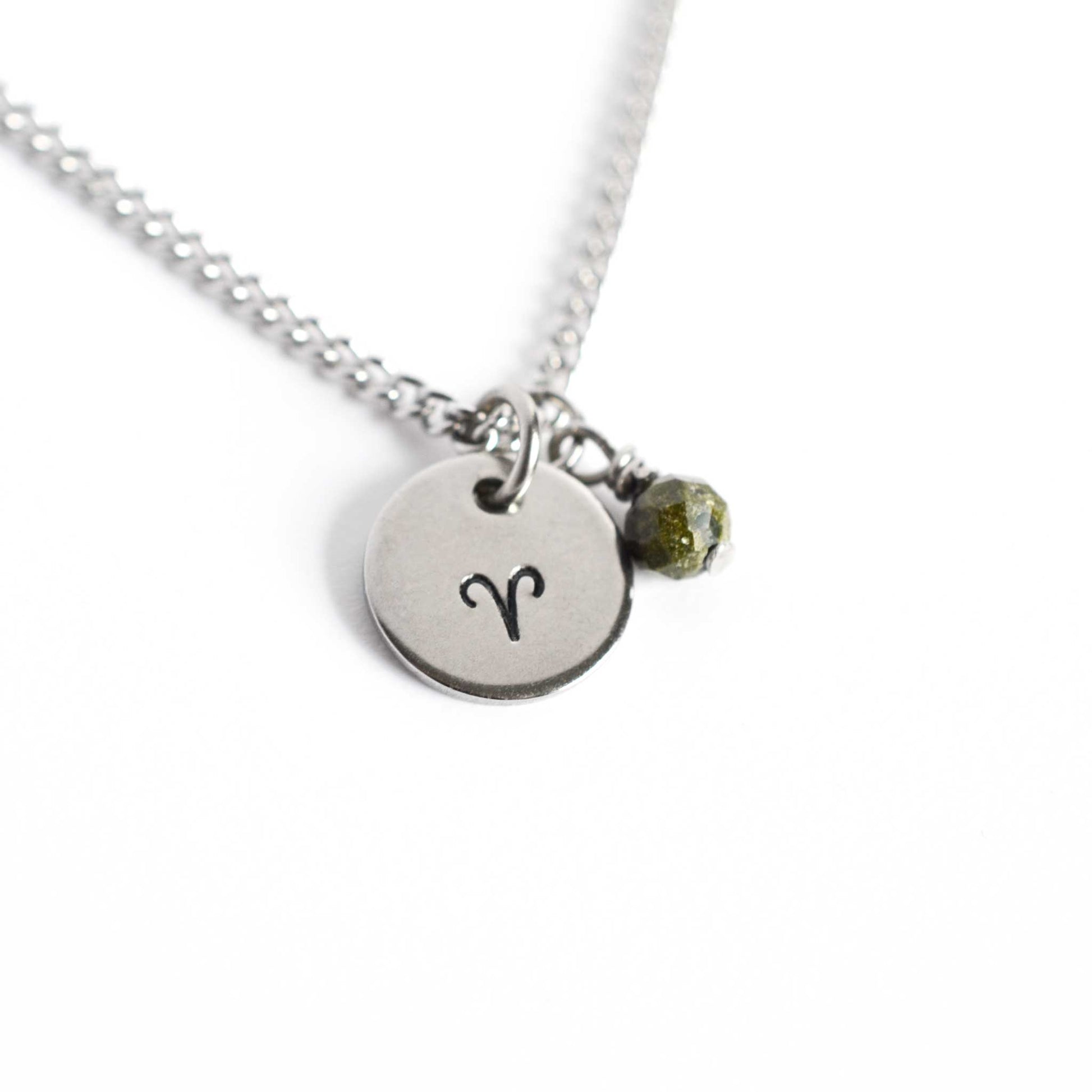 Aries Zodiac pendant necklace with tiny Bloodstone gemstone charm on white background