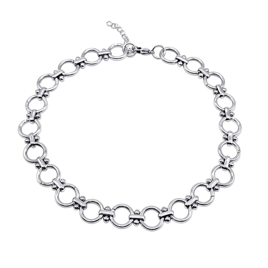 Stainless steel chain necklace on a white background