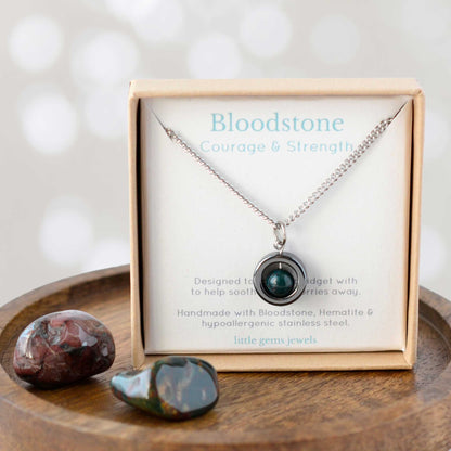 Bloodstone for courage and strength spinner necklace in eco friendly gift box.