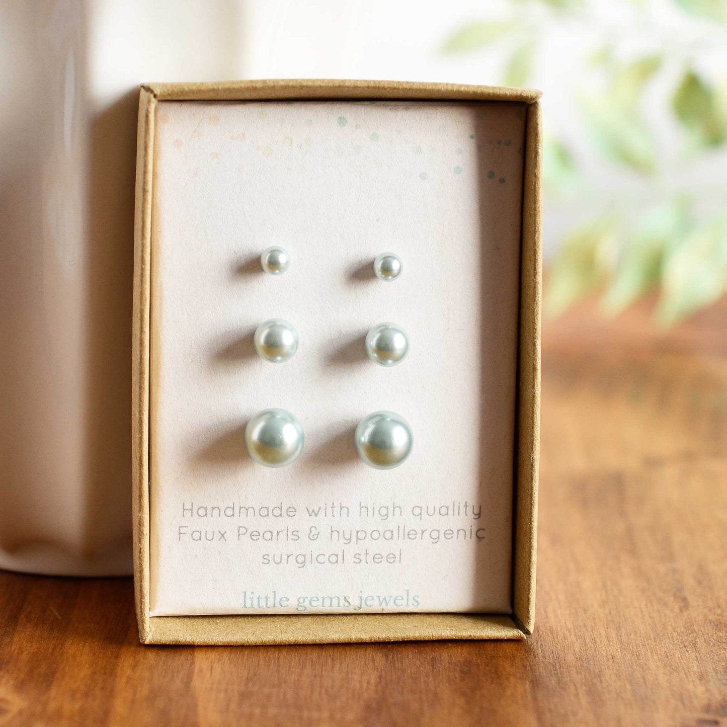 Set of three pale blue faux pearl stud earrings in eco friendly gift box