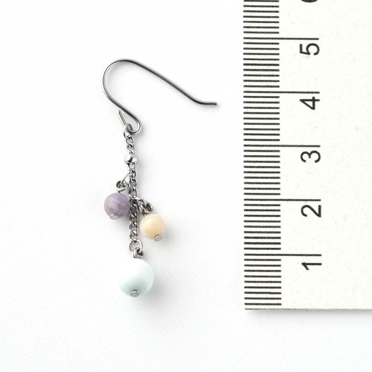 Pastel gemstone beads drop earring next to ruler showing 4.5cm length