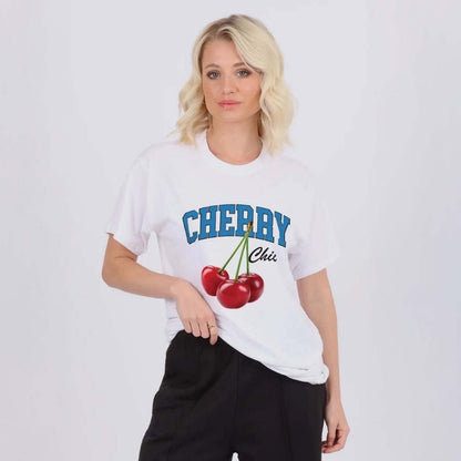 Person wearing a white t-shirt with 'CHERRY CHIC' text and cherry graphics on a plain background