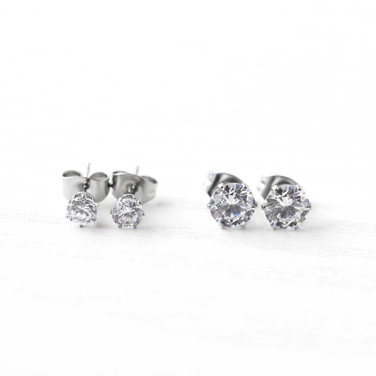 4mm & 6mm CZ Stud Earrings On White Background.