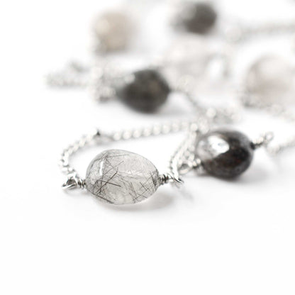 Close up of Tourmalinated Quartz gemstone nugget bead