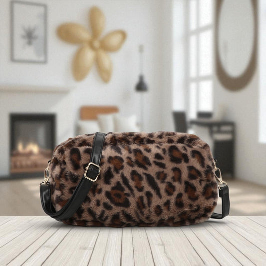 Leopard print bag on a wooden surface with a blurred indoor background